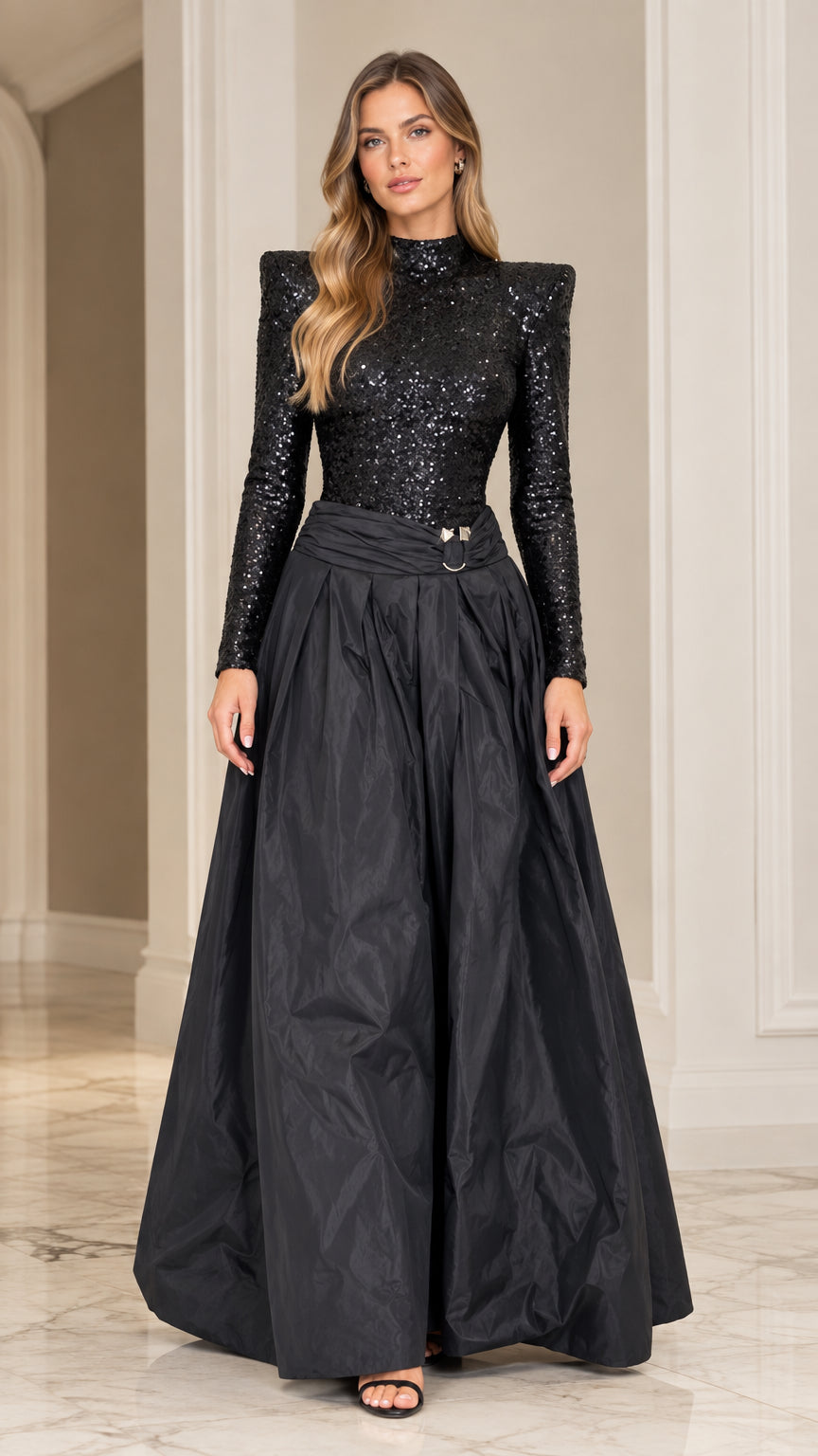 Front view of black long sleeve sequined mock neck evening gown with full skirt