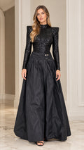 Front view of black long sleeve sequined mock neck evening gown with full skirt