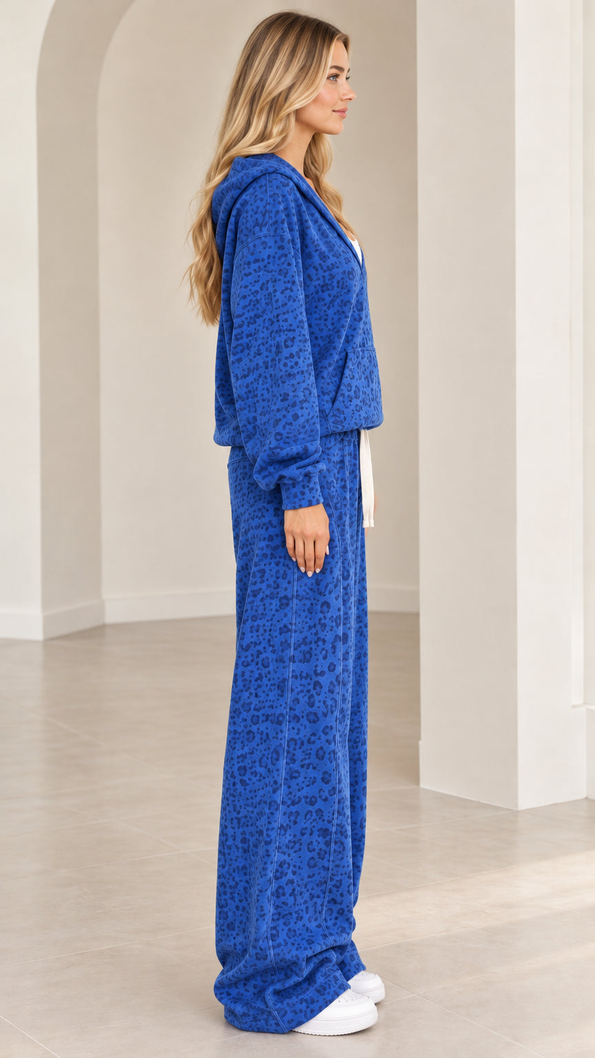 Side profile view of woman wearing Royal Blue leopard print loungewear set