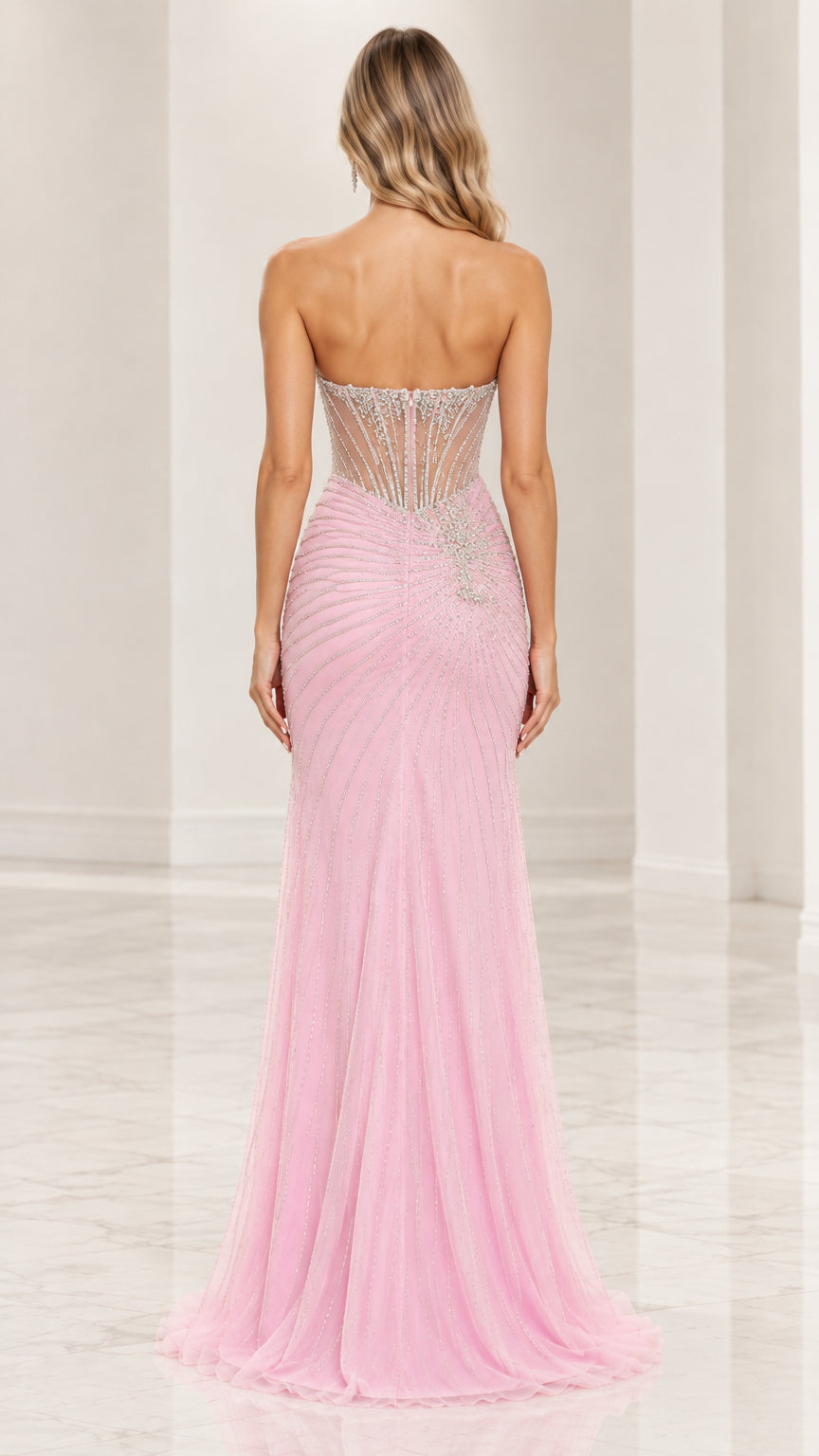 Rear view of model wearing pink floor-length corset evening gown with sheer back
