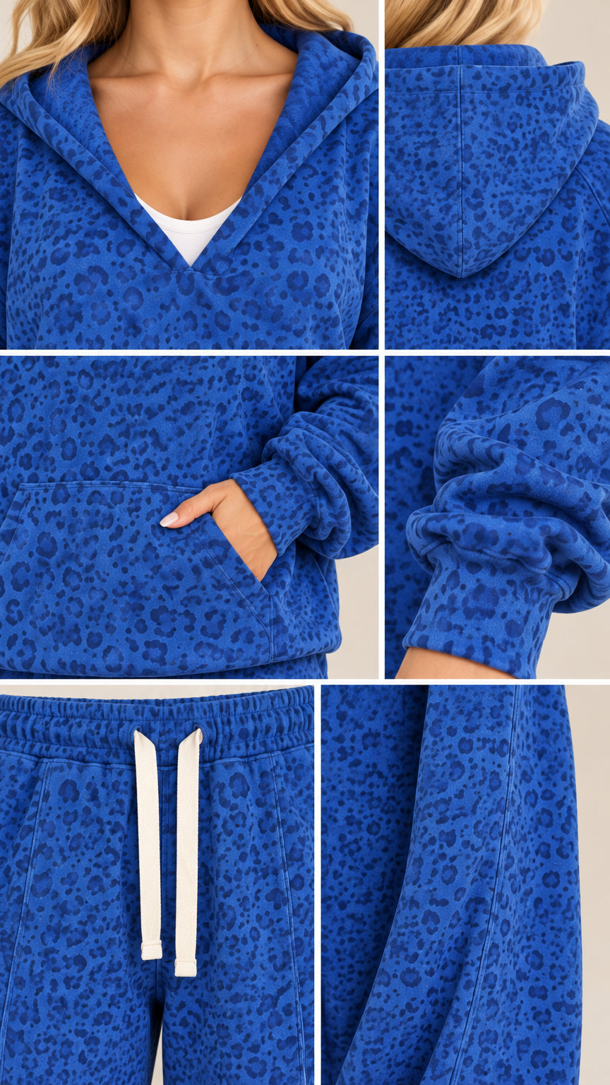 Close-up details of Royal Blue set showing neckline, hood, kangaroo pocket, ribbed cuffs, and drawstring waist