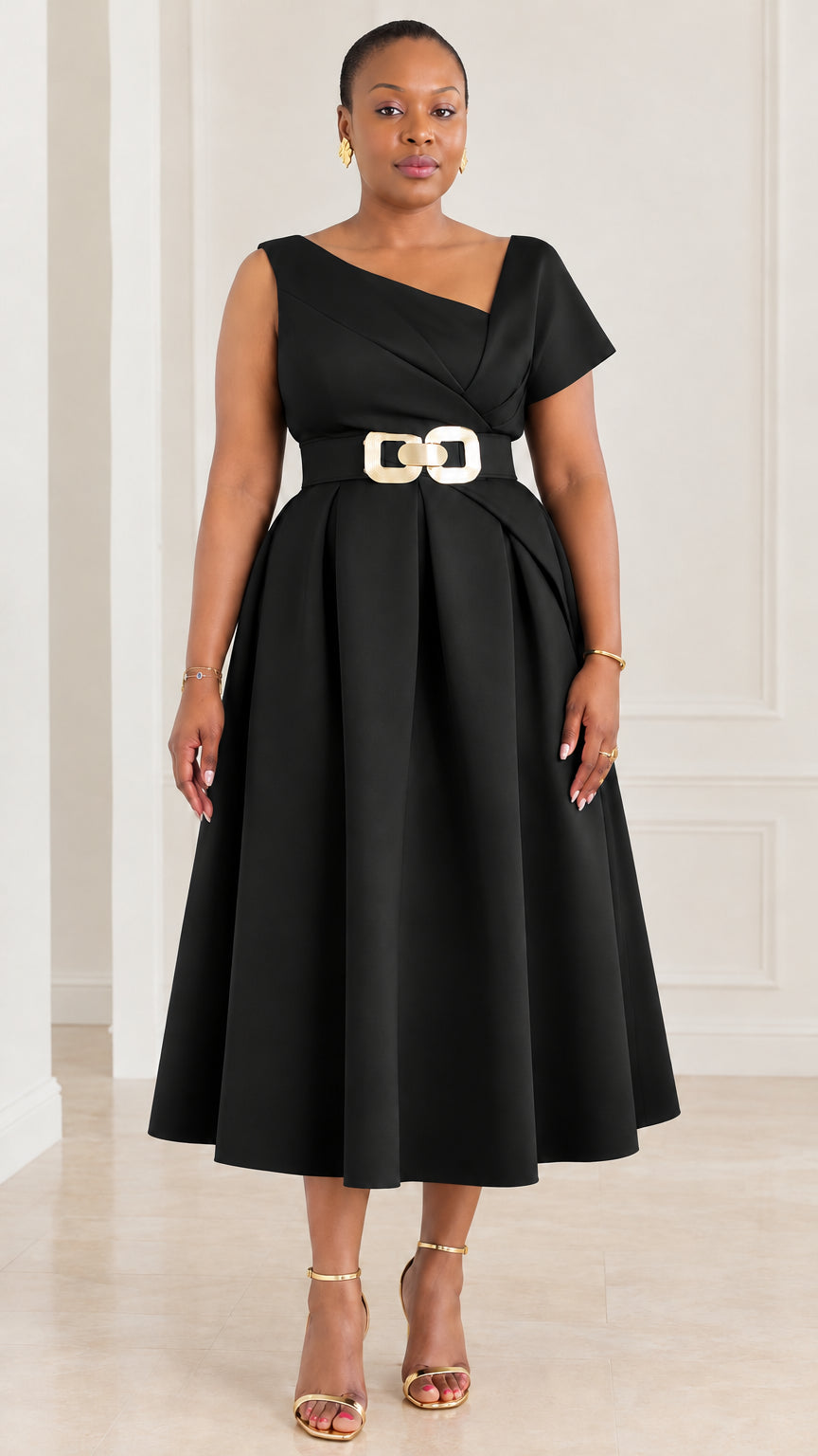 Front view of woman wearing black asymmetrical neckline belted pleated midi dress