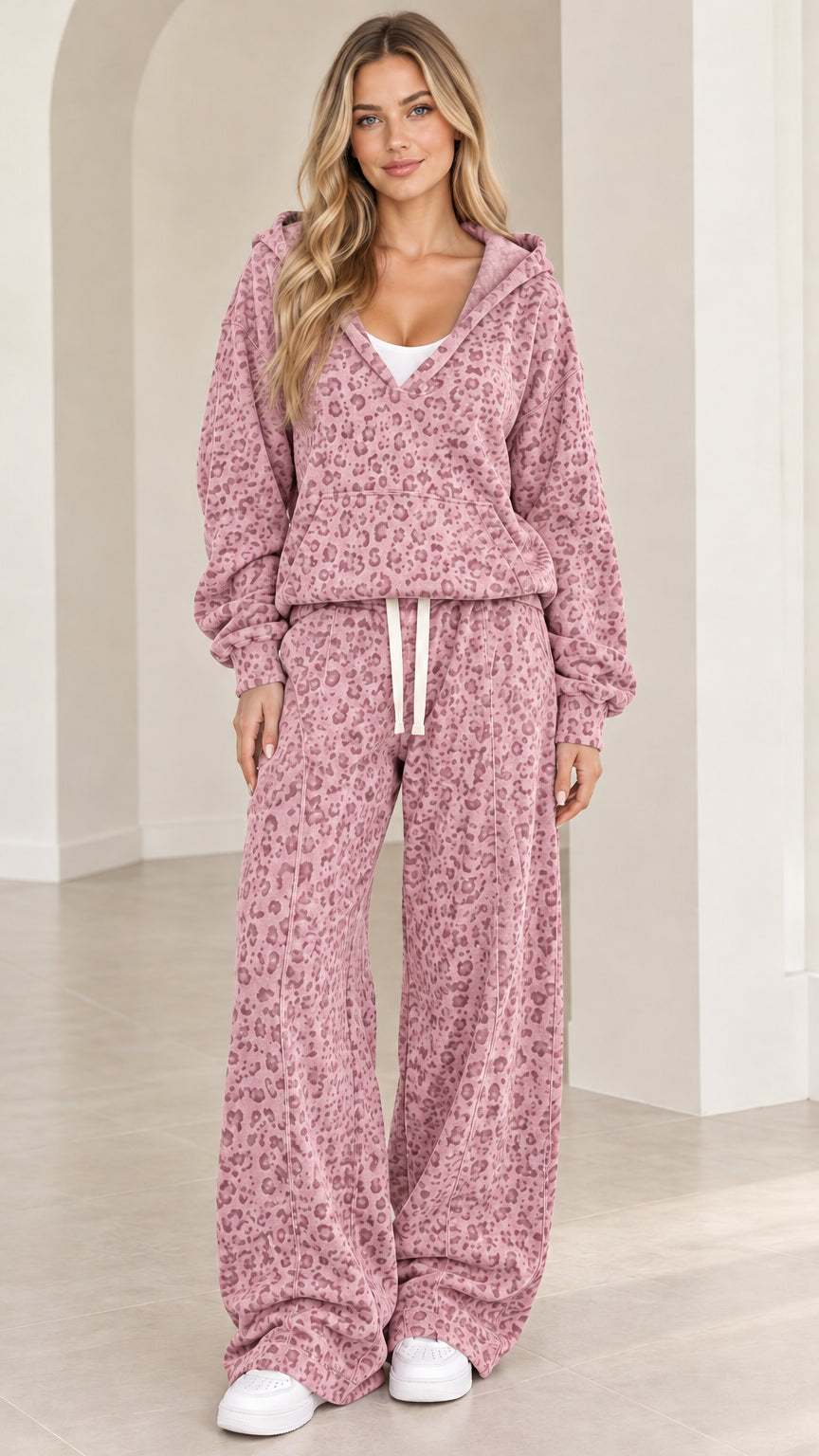 Front full-length view of woman wearing Dusty Pink leopard print hooded lounge set