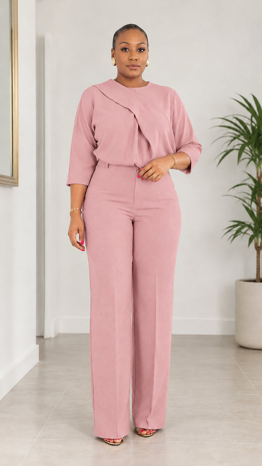 Front view of woman wearing Dusty Pink asymmetrical draped blouse and pant set