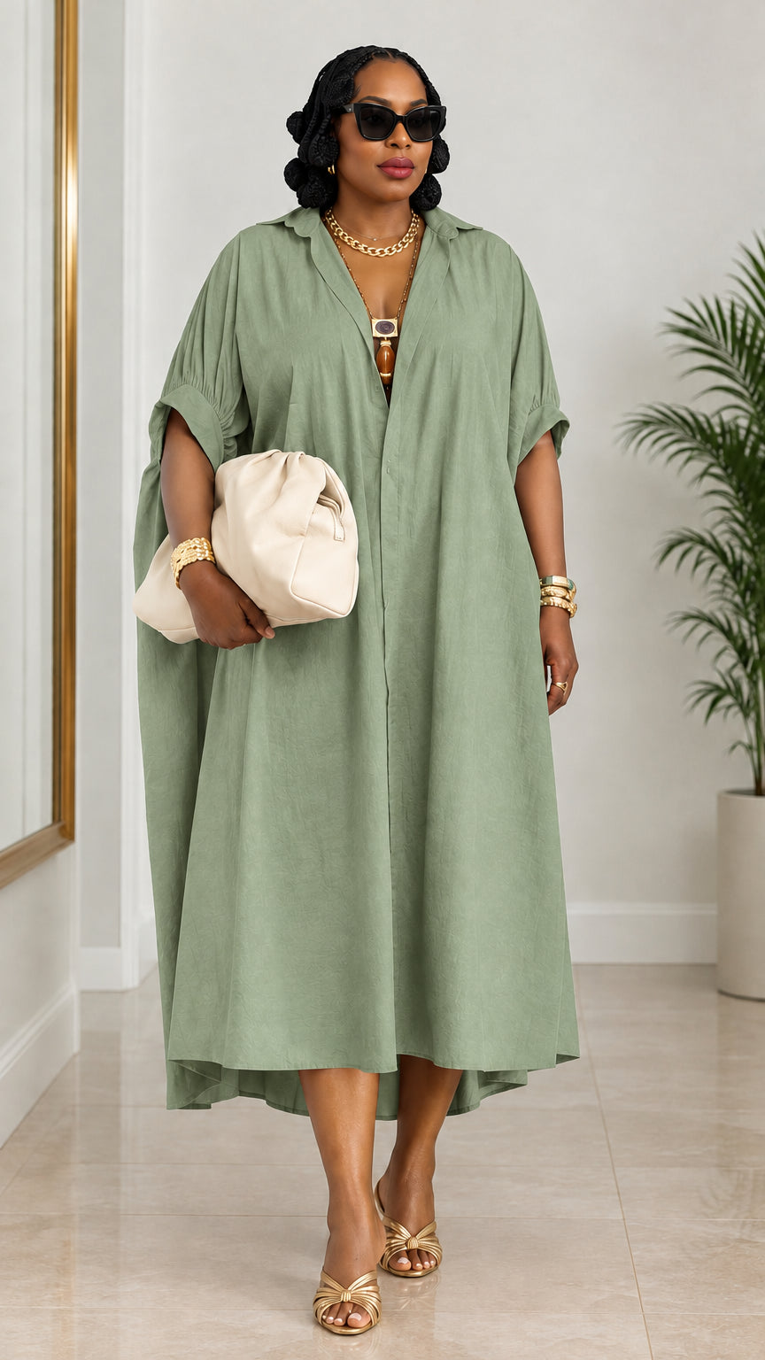Woman wearing sage green oversized kaftan shirt dress with ruched sleeves