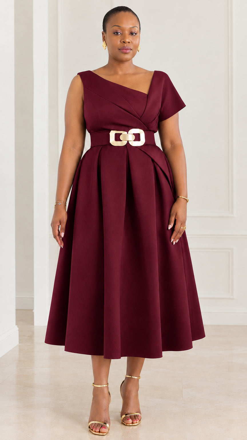 Front view of woman wearing burgundy asymmetrical neckline belted pleated midi dress
