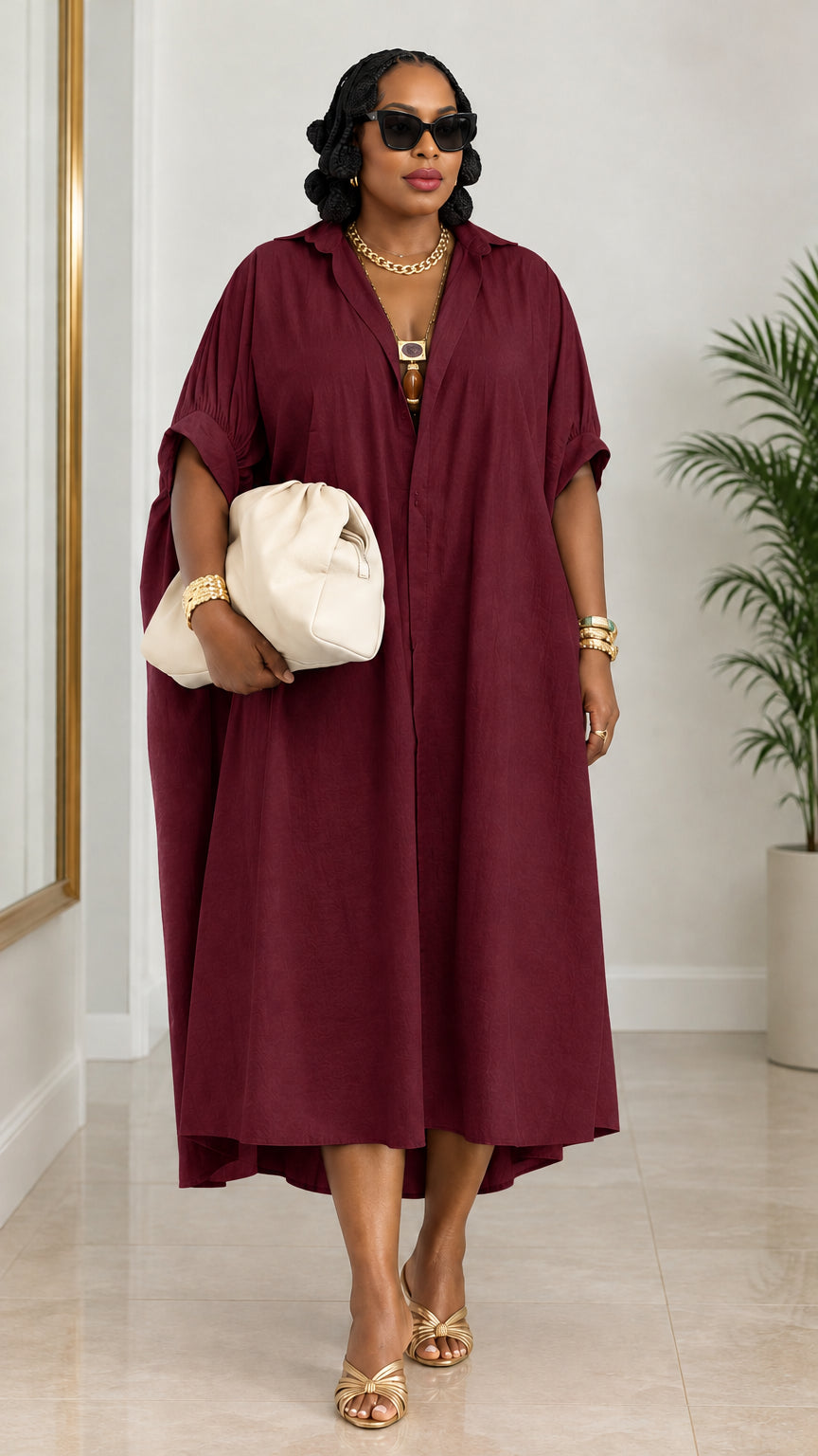 Woman wearing burgundy wine red draped shirt dress with lapel collar