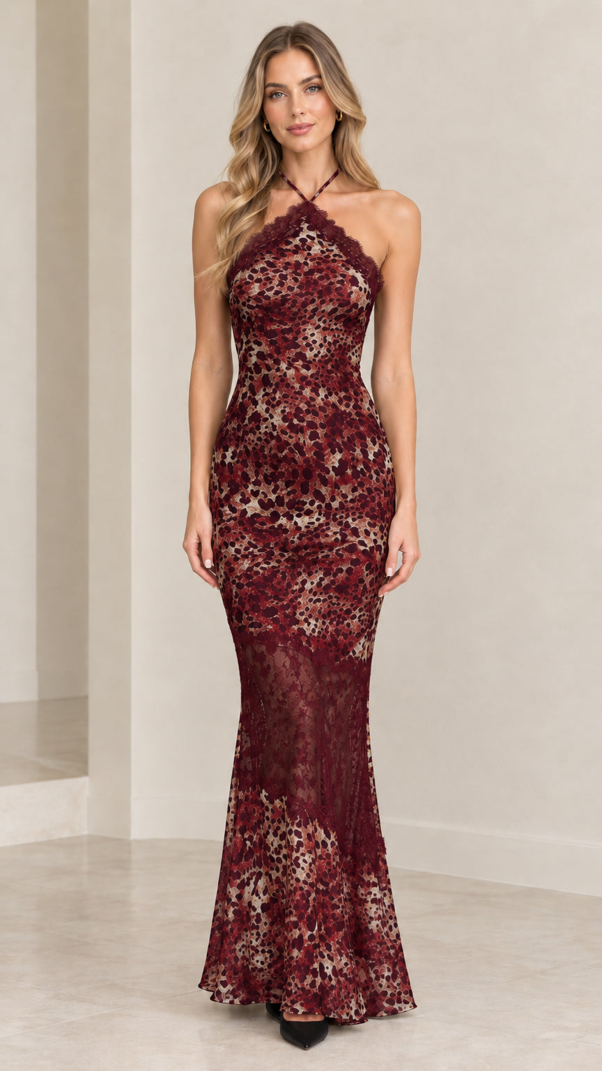 Front view of burgundy leopard print halter maxi dress with lace inset