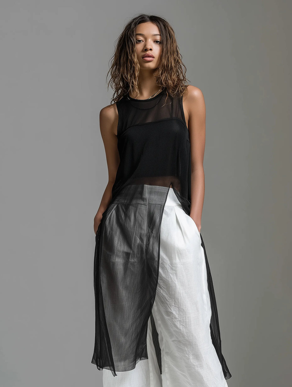 Women's Minimalist Black Chiffon Sleeveless Round-neck Top Paired With White Cotton-linen Trousers (includes Black Camisole) MDZ1625F1LXY