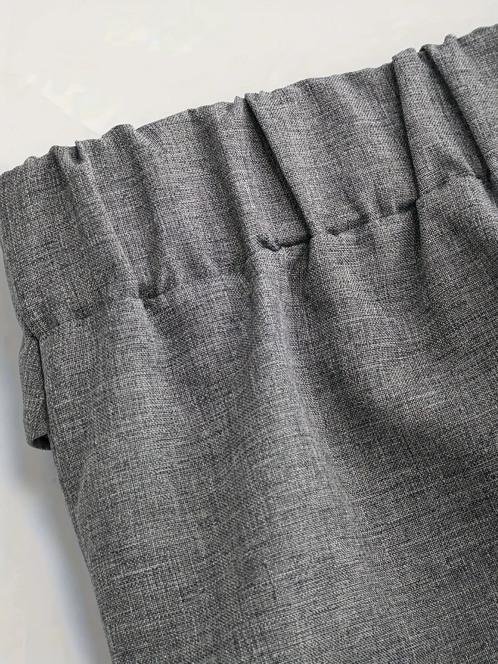 Chic And Sophisticated Grey Wide-leg Trousers With A Wrap-waist Design.