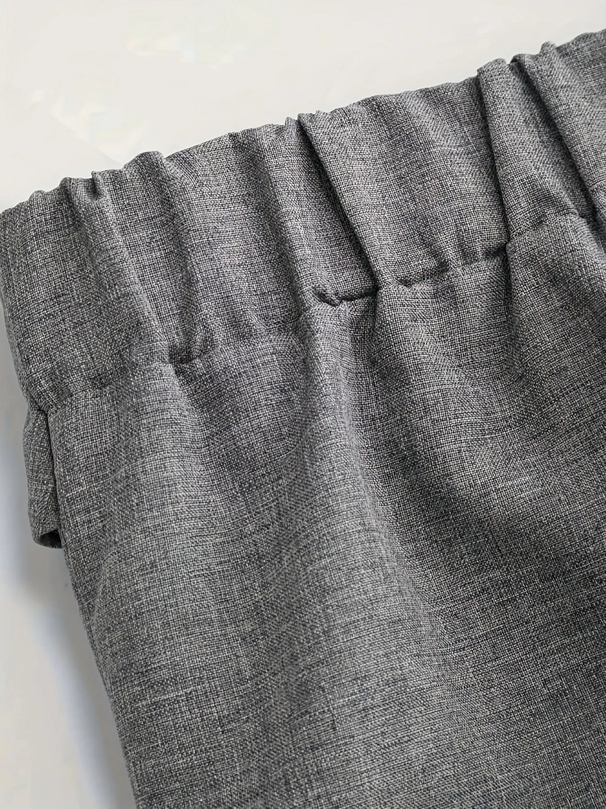 Chic And Sophisticated Grey Wide-leg Trousers With A Wrap-waist Design.
